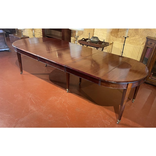 Superb 19th-century Louis XVI style mahogany dining table with six legs, measuring 2.73 meters in length, featuring a...