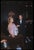 A Couple At The Met by Toni Frissell A couple enjoy drinks in a luxury suite at the opening of the New Metropolitan Opera...