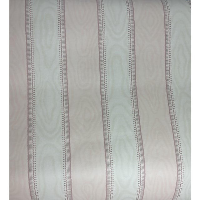 This Nina Campbell wallpaper is ready-trimmed and wipeable. There are alternating baby pink and taupe stripes with a wood...