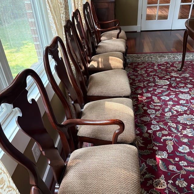 Thomasville Collector's Cherry Dining Room Set. 106 inches at full length with 2 inserts so the table can be expanded or...