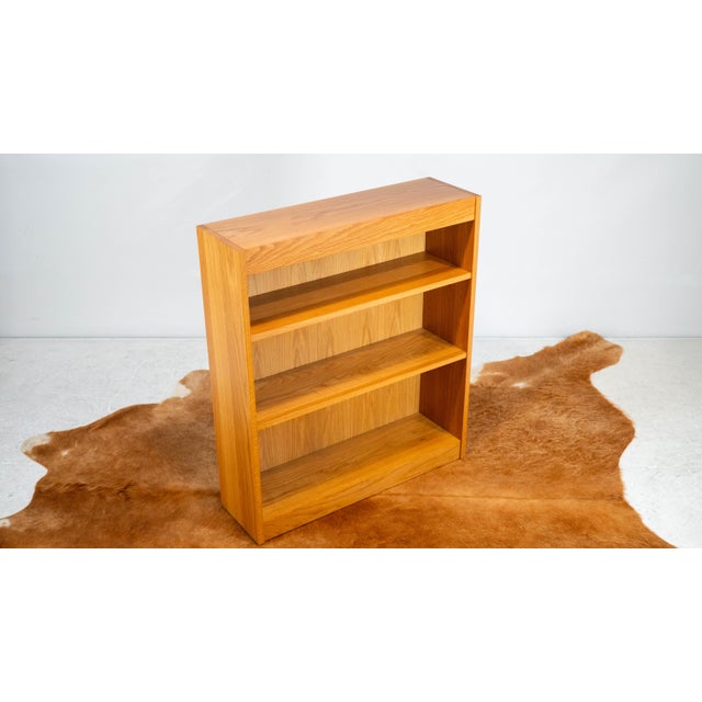 Charles Webb white oak bookcase, circa 1980s. Beautiful white oak wood showing vibrant woodgrain details. Smooth clean...