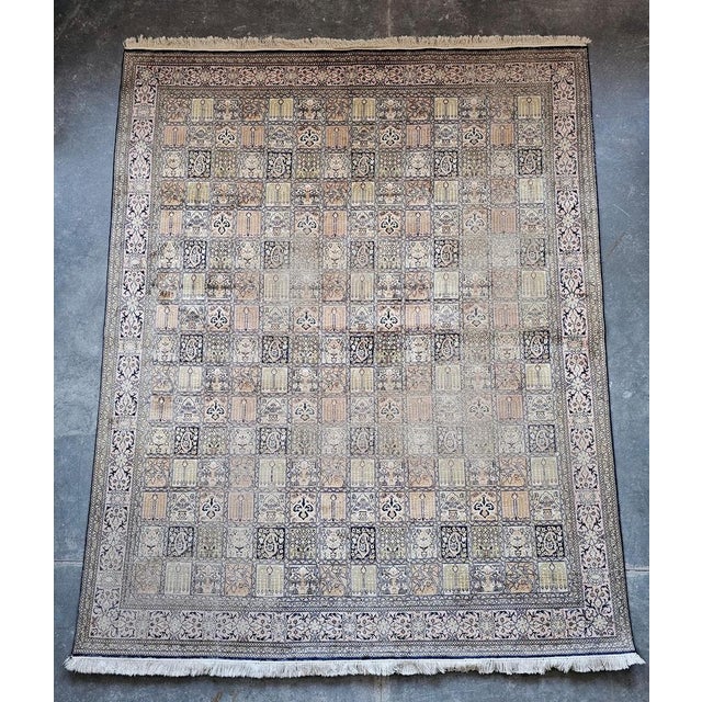 In this listing you will find a Vintage XL hand-knotted Silk rug "Garden of Paradise", done in combination of light,...
