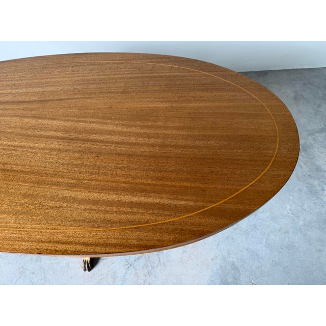 1960s Hollywood Regency Neoclassical Style Mahogany Oval Coffee Table With Brass Claw Feet For Sale - Image 9 of 12