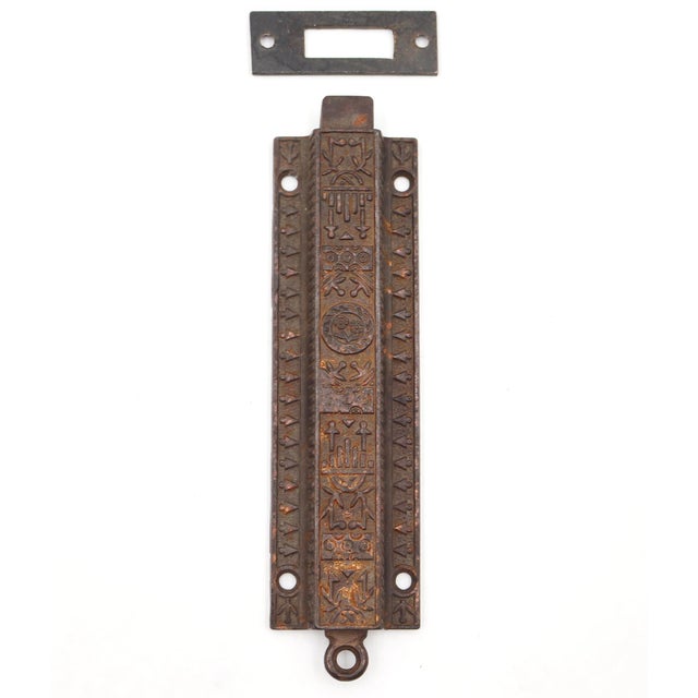Antique Aesthetic style cast iron spring bolt latch with a brass strike plate. Good condition with surface rust from prior...
