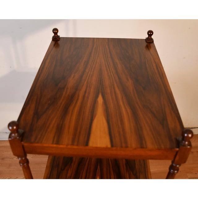 We are pleased to offer this beautiful Antique English Regency Etagere, from the 1910s. Made of book-match Rosewood,...