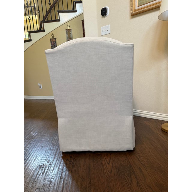 Ethan Allen small scale swivel chair model 207937 is a compact, hand-tailored accent piece designed to fit neatly into...