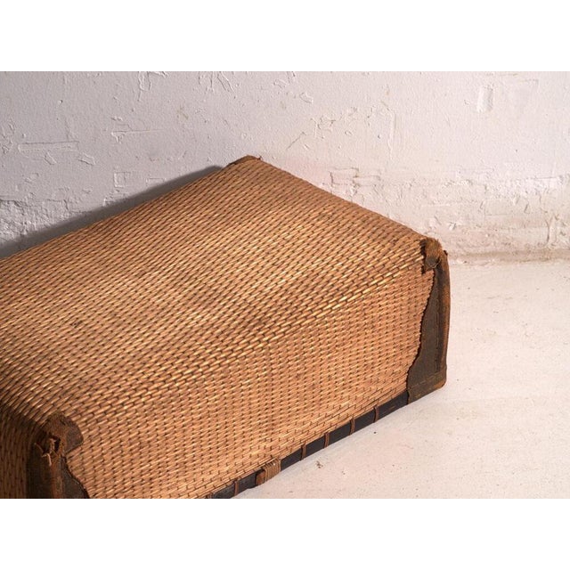 This antique japanese storage trunk set of two is a willow-wicker kōri set of two pieces with a full lid, a dense weave...