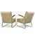 A pair of functionalist armchairs featuring a characteristic chromed tubular steel frame with clean, elegant lines. The...