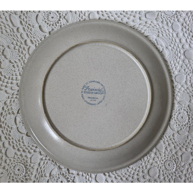A Mikasa large brown Provincial style ceramic platter. Made in Japan and measuring 12” diameter x 1 ¼” d. A lovely boho...