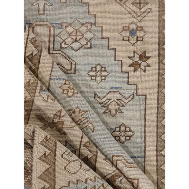 Character, tradition, pattern and palette converge in this gorgeous vintage hand woven Turkish rug. Light colored Oushak's...