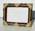 Heavy brass-formed photo frame with enamel and bejeweled trim. Ornate and grand color scheme with red and green enamels...