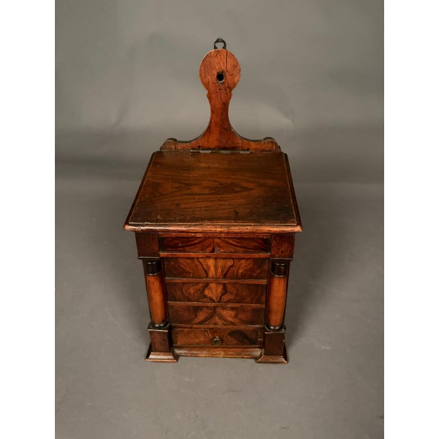 Charming early 19th-century French salt box dating to circa 1820, crafted in walnut and featuring beautifully figured burl...