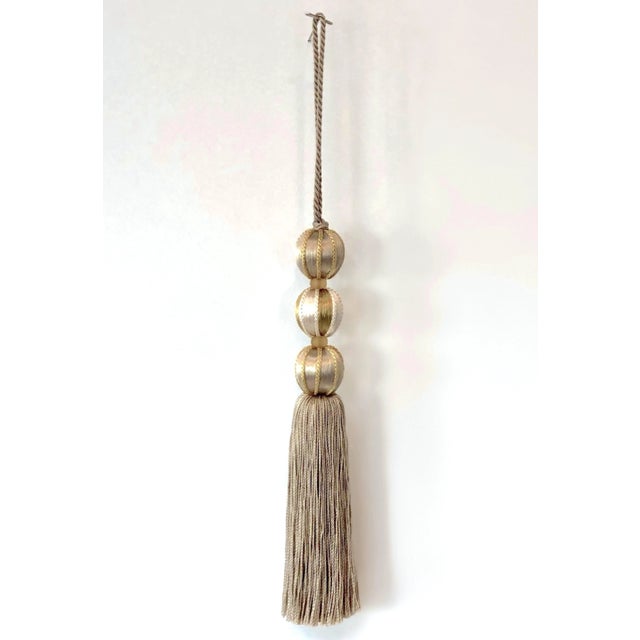 Adding modern bohemian vibe to your home couldn't be easier with this pair of satin beaded key tassels in neutral Mineral...