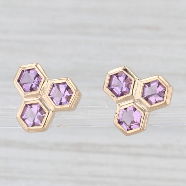 Gemstone Information: - Natural Amethysts - Cut - Hexagon Color - Purple Metal: 14k Yellow Gold Weight: 4.3 Grams Stamps:...