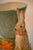 This charming cachepot or vase by Dana Gibson features a rabbit with carrots and lettuce standing guard against a sky blue...