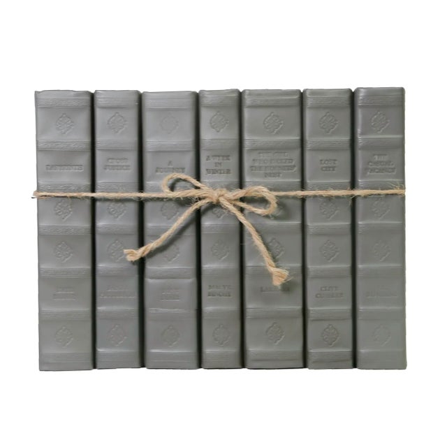 One linear foot of rebound leather books (7-9 books) from E. Lawrence. All books are published between 1980 to current....