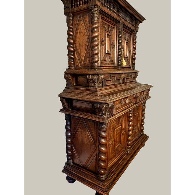 Circa 1740, early 18th century: Beautiful antique walnut barley twist French Louis XIV Deux Corps (two bodies) buffet...
