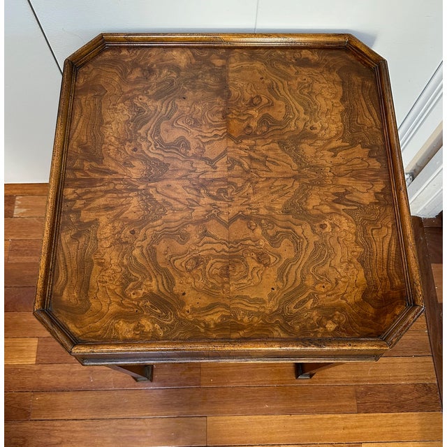 The burl veneers on this table are fabulous. I love this table and I am sure it is quite unique -- a vintage Chinese style...