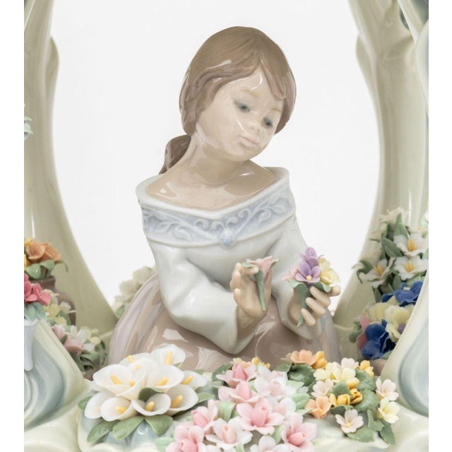 Lladro "Gazebo in Bloom" Porcelain Figurine, marked and numbered "367" to underside, mounted on wood base. Overall: 19.5"...