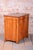 This elegant antique commode, functioning as a small cabinet, is an excellent example of middle-class furniture from the...