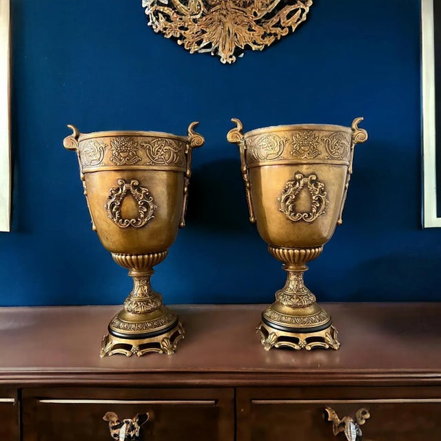 A pair of stunning large antique bronze urn with an ormolu base. It is just exquisite and would look gorgeous as a...