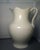 A beautiful 19th century saltglaze pitcher measuring 11.5" tall of baluster shape with nicely flared rim and applied...