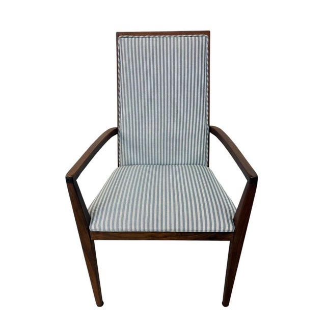 Elevate your dining space with this exceptional set of four Mid-Century Modern Dillingham walnut dining chairs, circa...