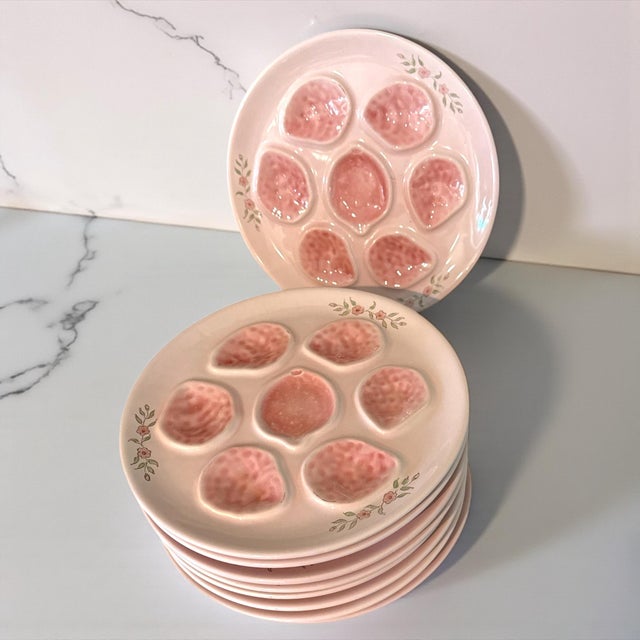 An exceptionally rare French oyster plates by M.B.F.A. Pornic, hand-painted on the Île d’Oléron in delicate blush pink...