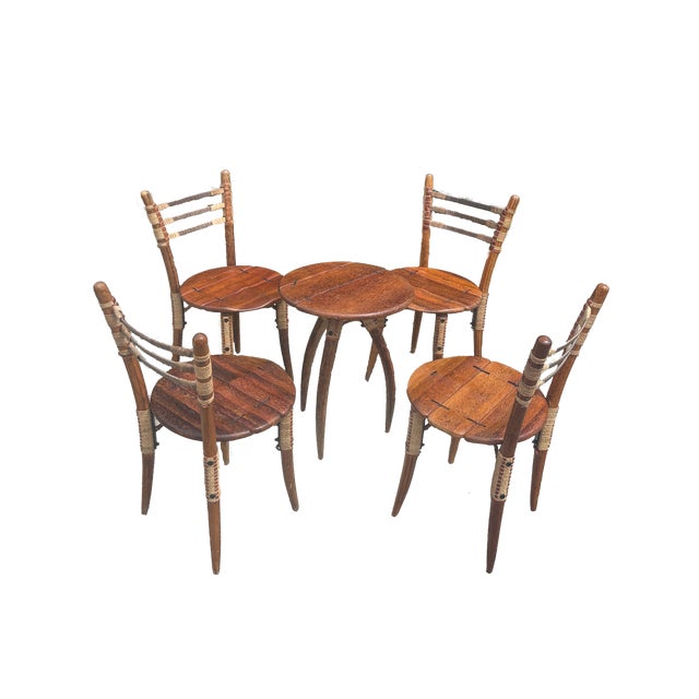 This sought after set from Pacific Green Furniture Co. in Fiji is handcrafted and hand finished using 100 year old palm...