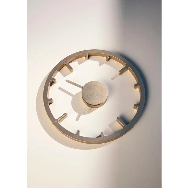 Real by Michael Young Dimensions: Ø34 x H 25,6 cm Materials: Anodized champagne/black laser cut metal Michael Young This...