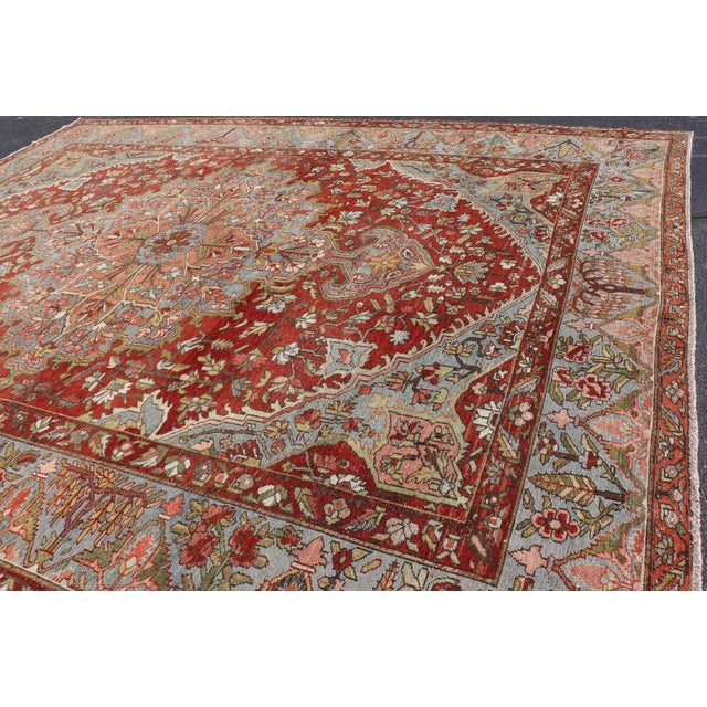Antique Persian Bakhtiari Rug With Red Field and Blue Medallion Design For Sale - Image 4 of 16