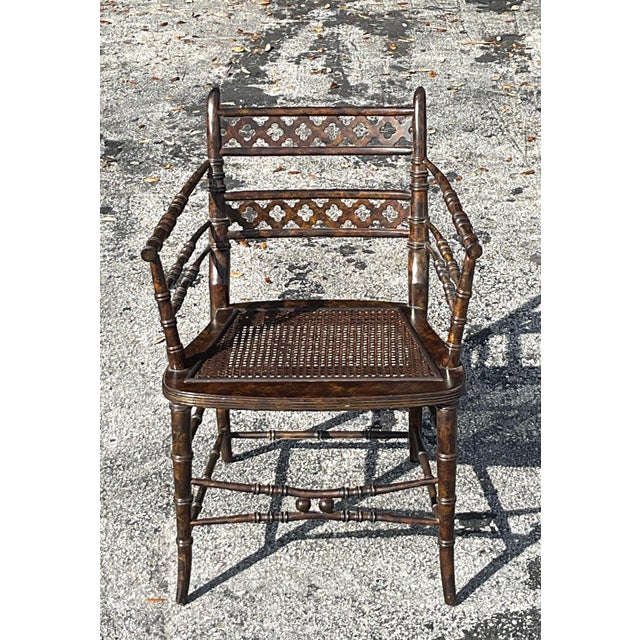 Elevate your space with this exquisite Vintage Regency Trellis Cane Chair, a timeless piece that blends elegance and...