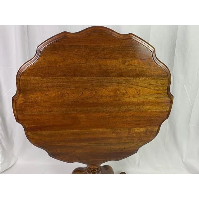 Add a layer of historic charm and exceptional versatility to your home with this vintage 1960s Chippendale-style tilt-top...