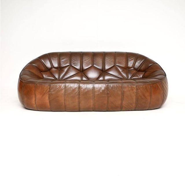 A stunning vintage Ligne Roset leather Moroccan ottoman sofa, designed by Noe Duchaufour-Lawrance. It dates from late...