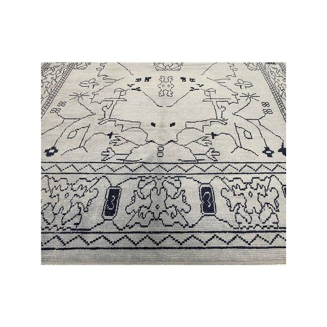 Exact Size: 9'4" x 13'10" Color: Natural Age: New Materials: Wool Construction: Hand Knotted Origin: Turkey