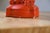1950s Pair of Vintage Orange/Vermilion Chalkware Emperor and Empress Statues From the Personal Collection of Artist Tawny Chatmon For Sale - Image 5 of 11