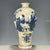 A charming Chinese blue and white porcelain vase featuring a distinctive all-over crackle (Ge-type) glaze. The vase has a...