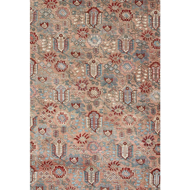 Measures: 10' x 12'. Antique Persian Bakhtiari Rug Featuring Repeating Floral Motifs and Rich Red. Keivan Woven Arts /...