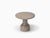 Designed by the Danish duo Depping & Jørgensen, this side table is a refined piece of art carved from solid limestone,...