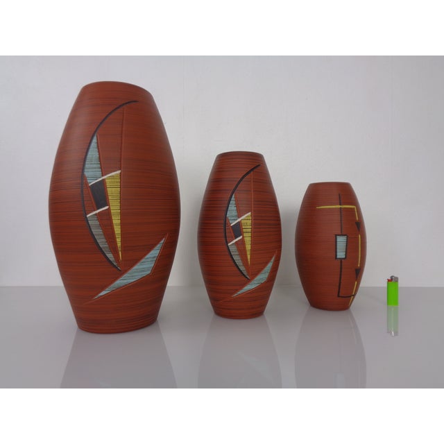Set of three ceramic vases by Decora Keramik from the 1950s. One vase has its original label. All three vases are marked...