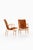 Pair of easy chairs in laminated birch and original leather webbing by bruno mathsson, 1968 additional information:...