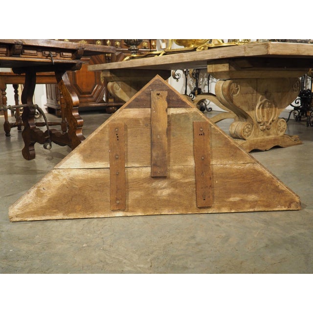 More information coming soon… Hand-carved in the 1700s in French oak, this triangular overdoor pediment features a winged...