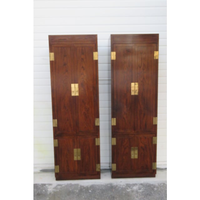 This excellent Pair of Armoires is made of wood, solid wood, veneer, and metal. They were made by Henredon Furniture with...