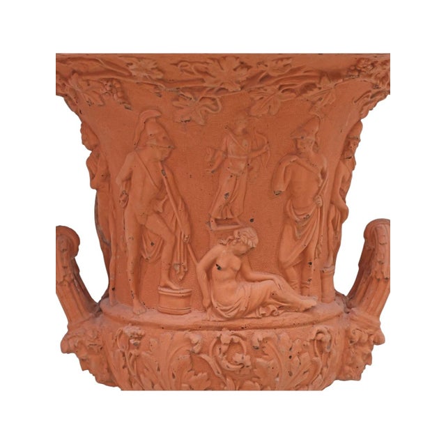 An impressive pair of Neoclassical style terracotta Campana urns inspired by the celebrated ancient Roman Medici Vase....