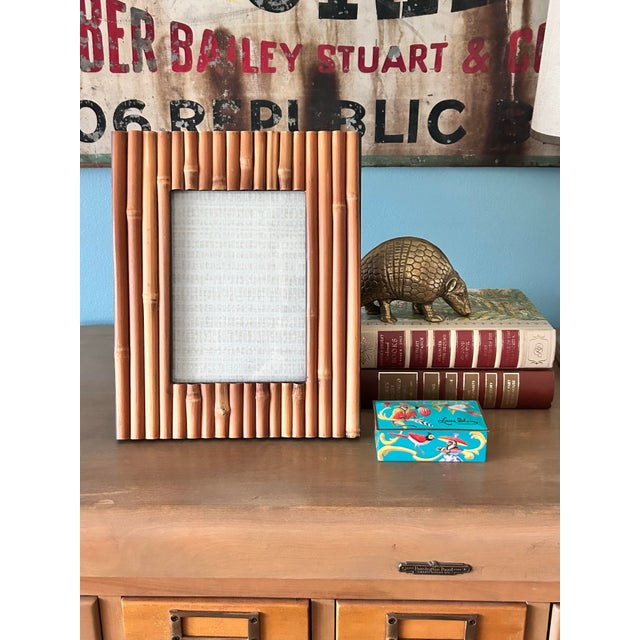 A warm, natural bamboo picture frame that brings relaxed coastal and boho texture to any tabletop or shelf styling. The...
