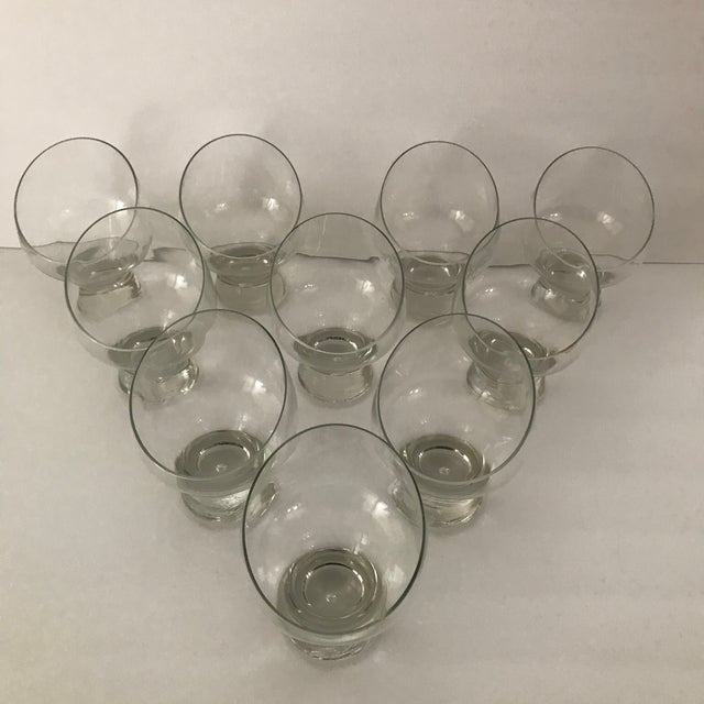 Very unusual and highly stylistic mid century “Egg Chair” blown glass cups. Set of ten cups, all in excellent condition...
