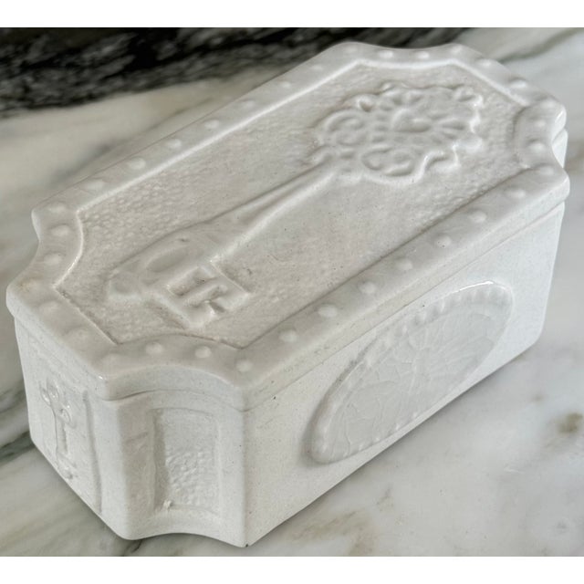 Presenting a vintage Jonathan Adler Heart Key Trinket Box for holding keys or odds 'n ends! A heart motif key decorates...