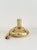 A brass-encased glass Ship’s Decanter with nautical cutouts, made in Sweden circa 1950s. Marked “Made in Sweden” on the...