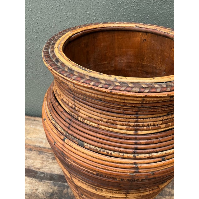 Elevate your interior with this exceptional vintage floor vase, a masterwork of Mid-Century Modern organic design....