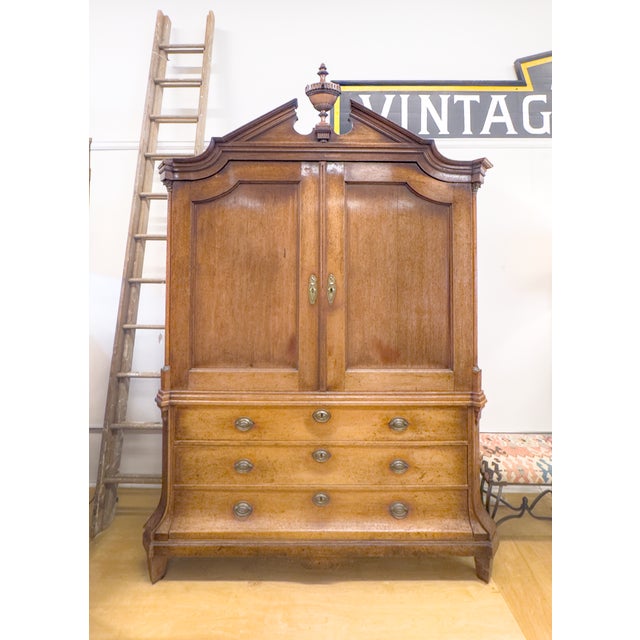 An 18th Century Dutch Rococo bombé armoire in beautiful condition.